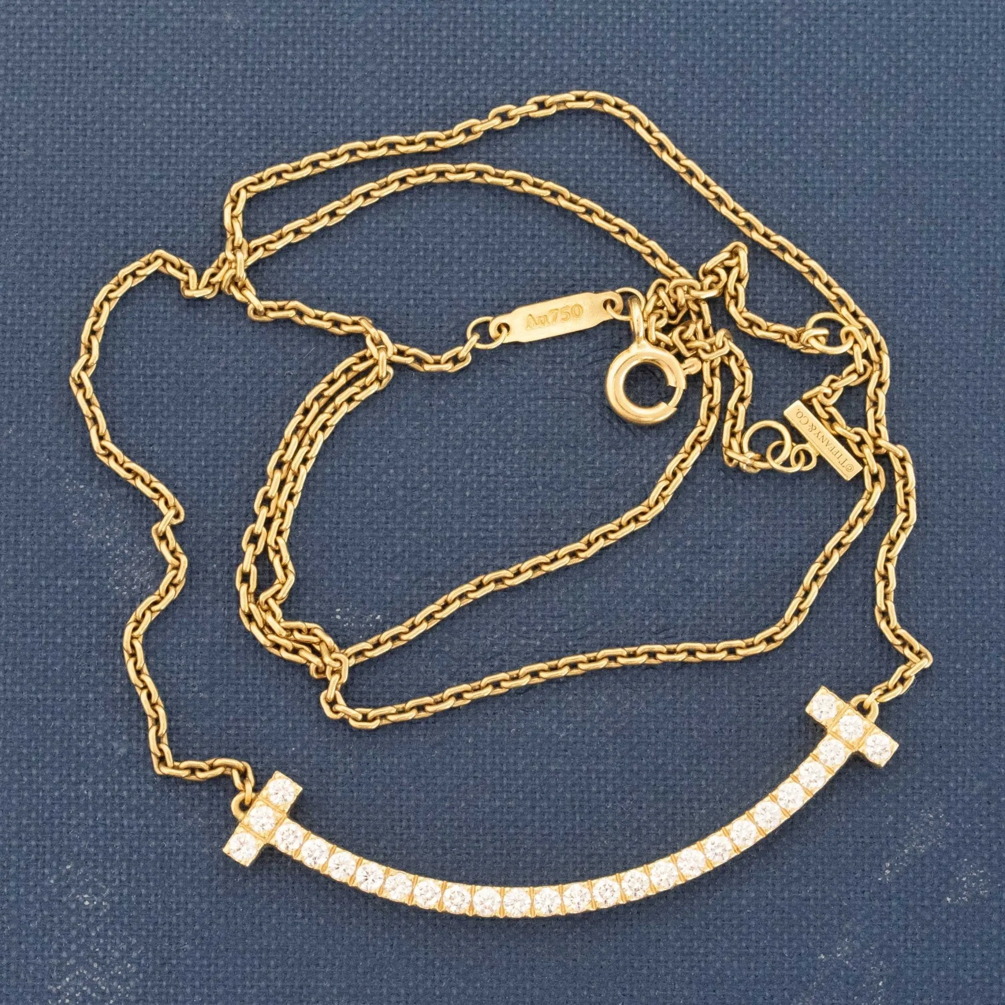 Diamond T Smile Pendant by Tiffany & Co.