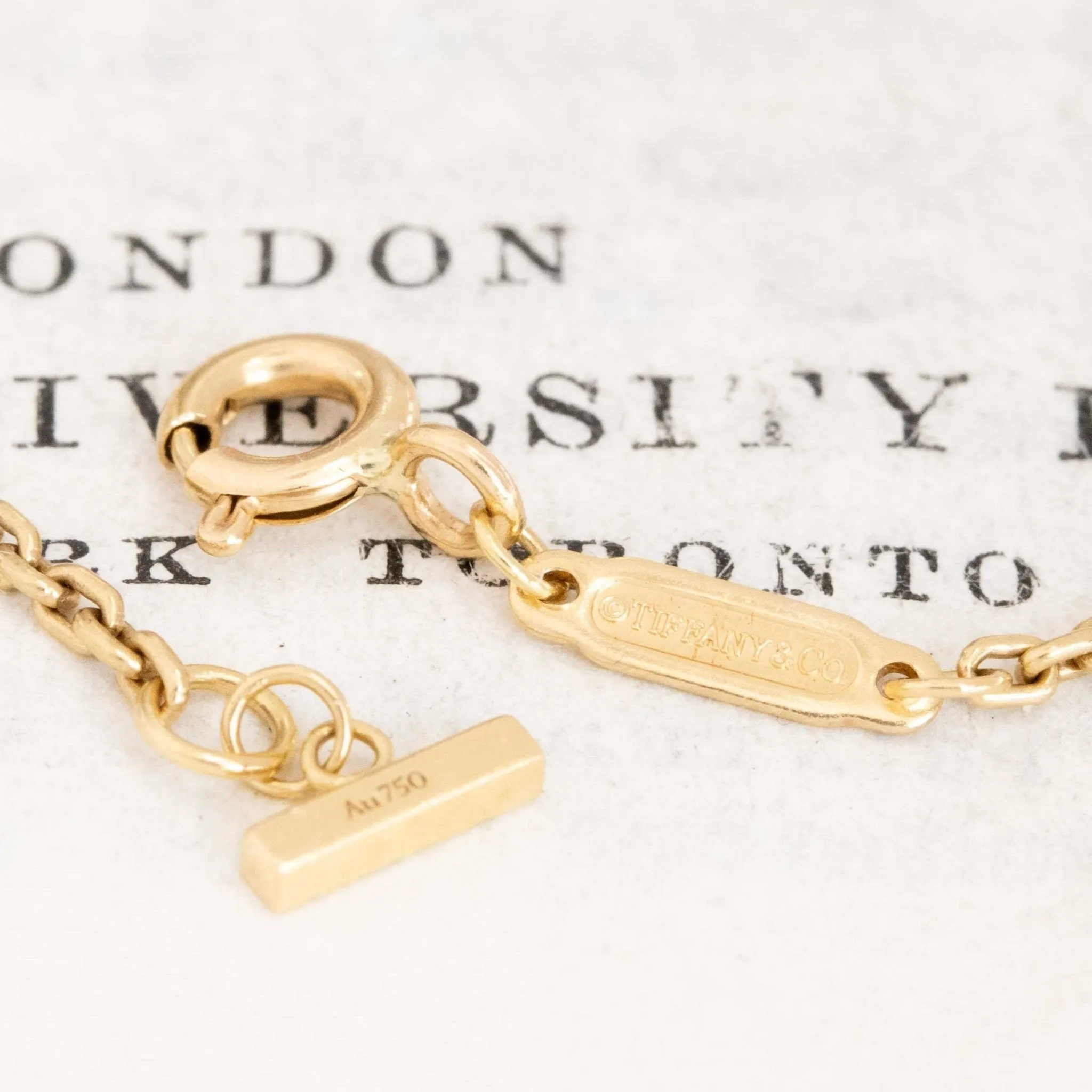 Diamond T Smile Pendant by Tiffany & Co.
