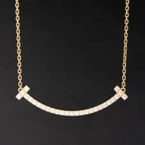 Diamond T Smile Pendant by Tiffany & Co.