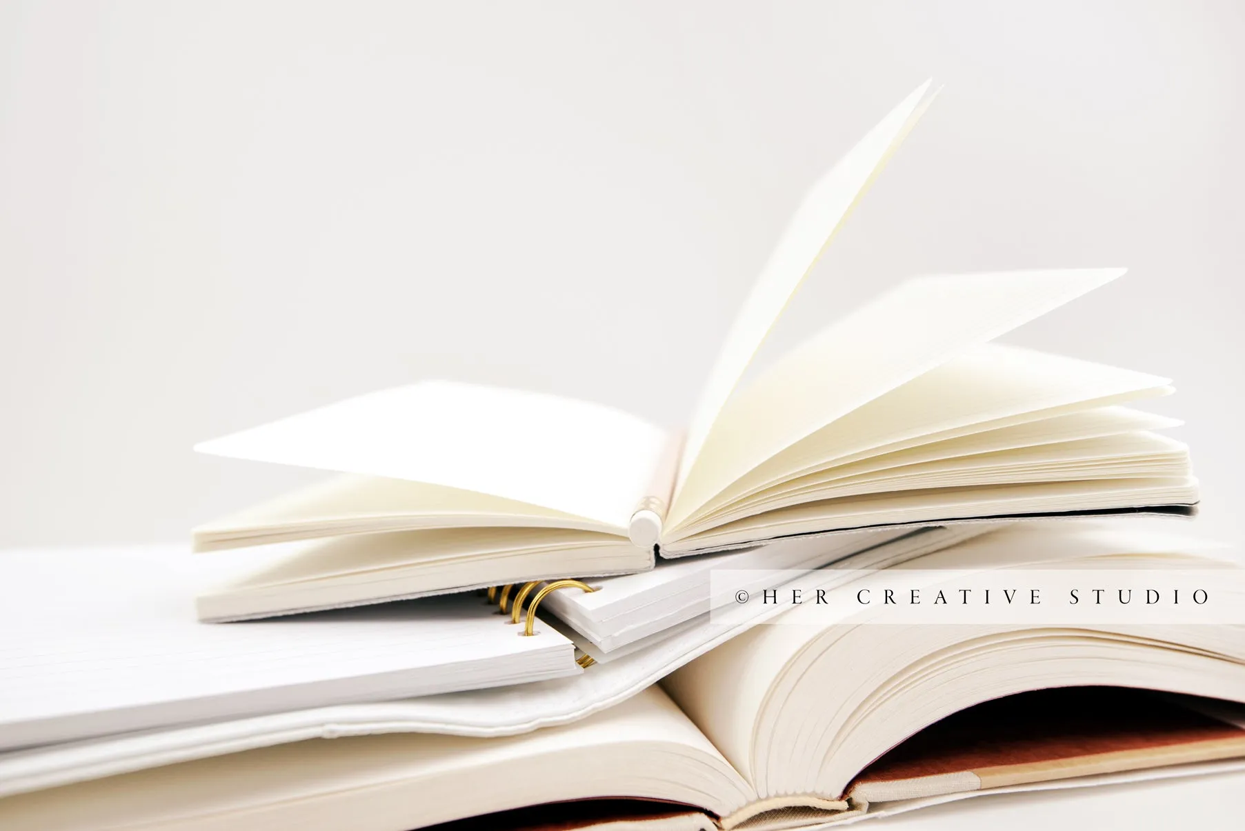 Open Notebooks in a Pile