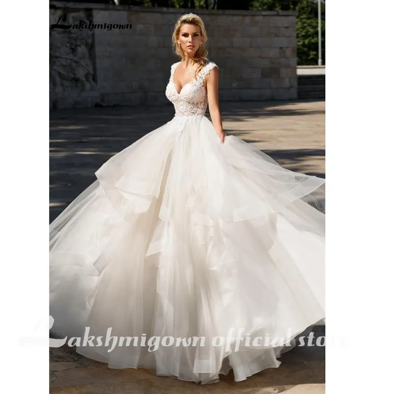 Roycebridal Elegant A-Line Ruffles Beach Champagne Wedding Dresses Deep V neck