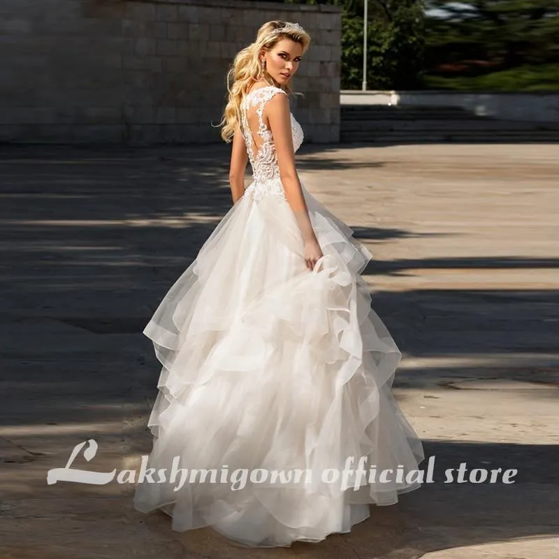 Roycebridal Elegant A-Line Ruffles Beach Champagne Wedding Dresses Deep V neck
