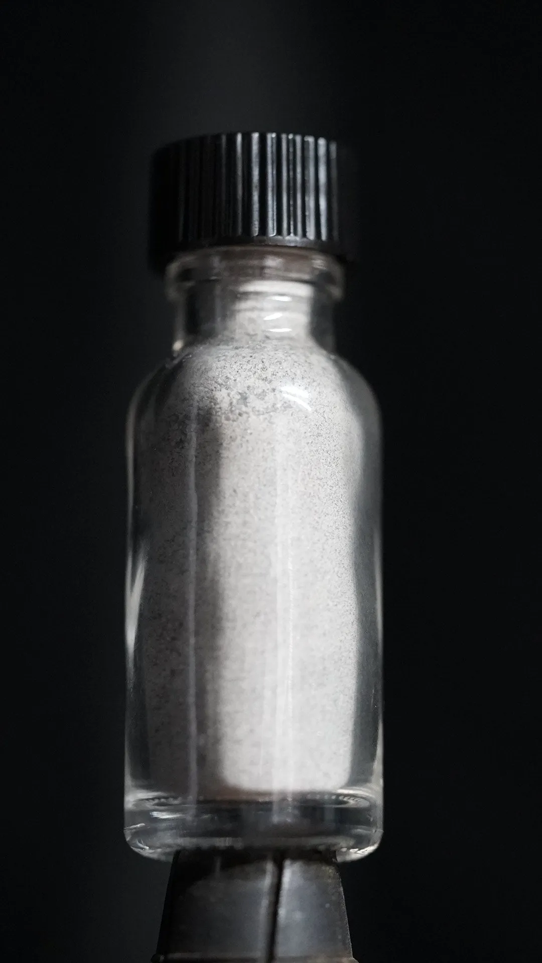 Small glass bottle of Yooperlite dust -1oz of dust - great for DIY